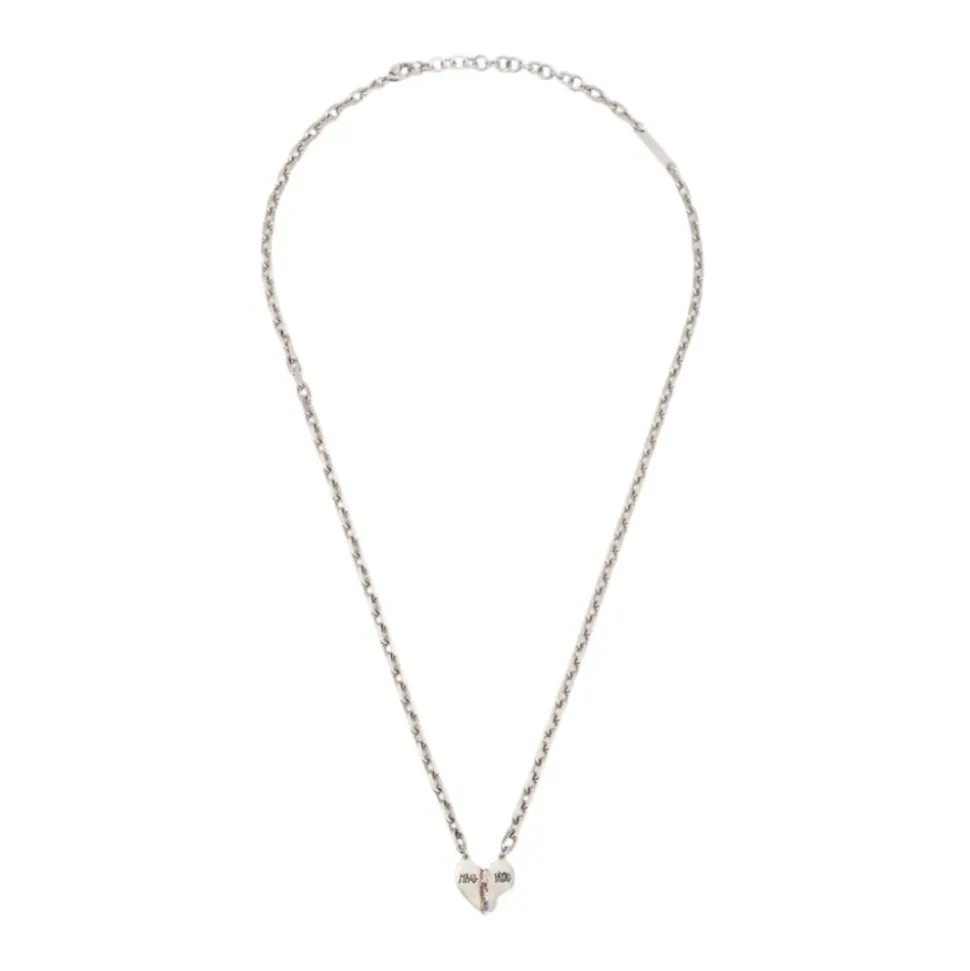 Collana in ottone placcato oro e argento con ciondoli