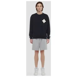 Felpa bouclé con toppa logo