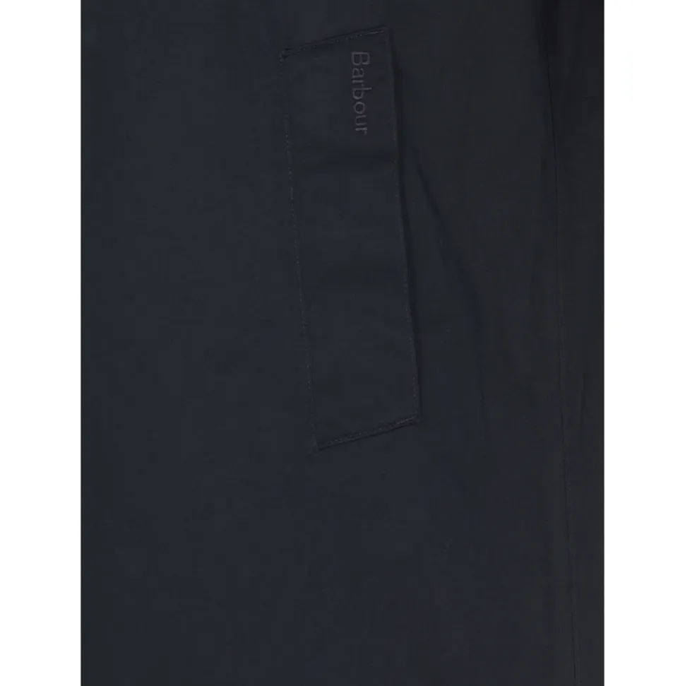 Impermeabile blu con colletto e tasche