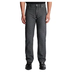 Jeans in denim jacquard con monogramma