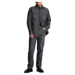 Jeans in denim jacquard con monogramma