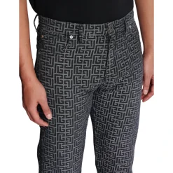 Jeans in denim jacquard con monogramma
