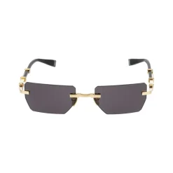 Occhiali da sole eleganti in oro e nero