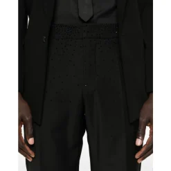 Pantaloni slim fit in lana fresca con strass