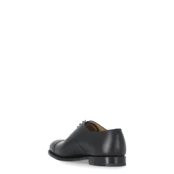 Scarpe basse stringate in pelle nera