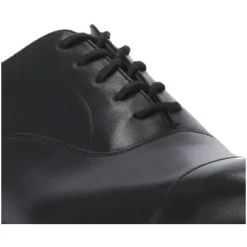 Scarpe basse stringate in pelle nera